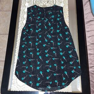 RW&CO black sleeveless blouse with green floral print
